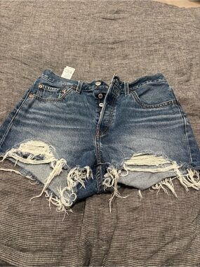 Levi's Distressed Cutoff Denim Shorts in Blue Wash